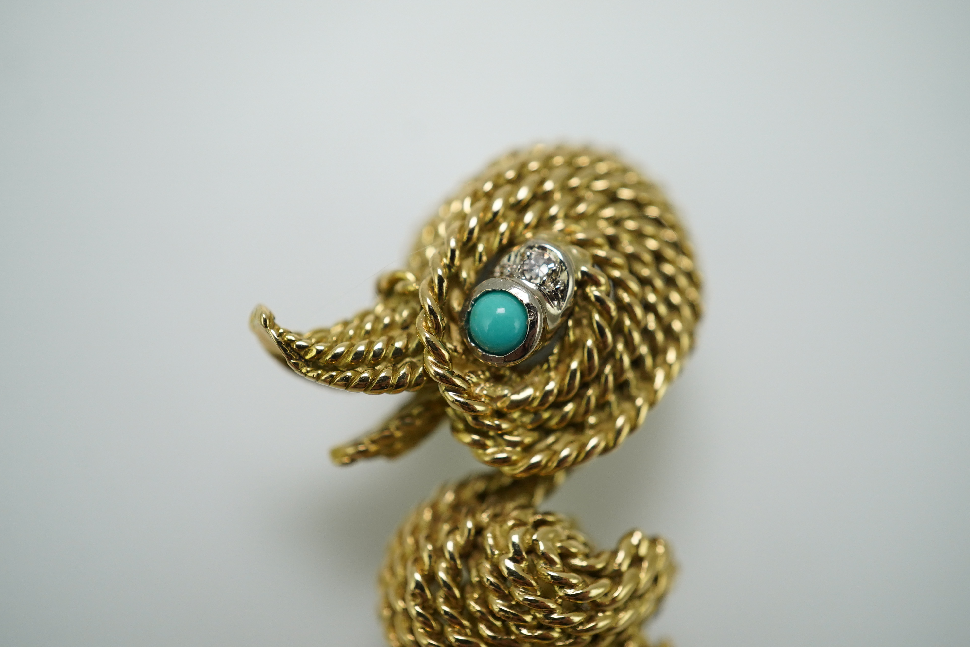 An 18ct gold, turquoise and diamond novelty brooch, circa 1961